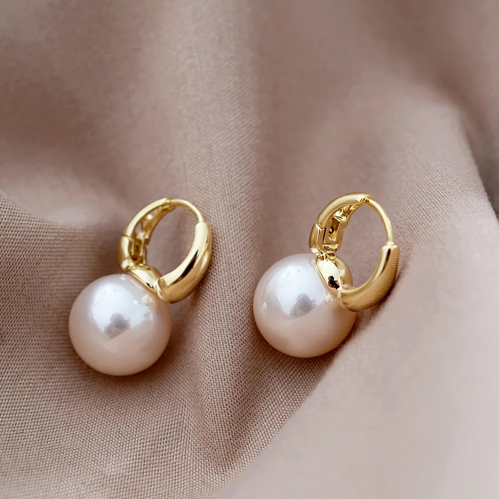 Pearl Earrings.