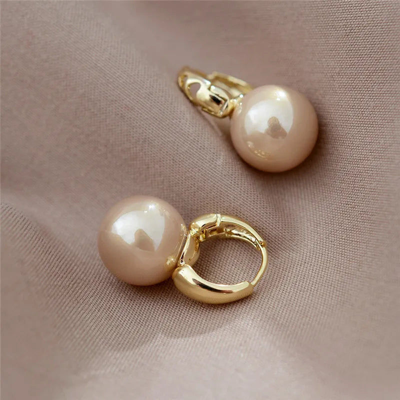 Pearl Earrings.