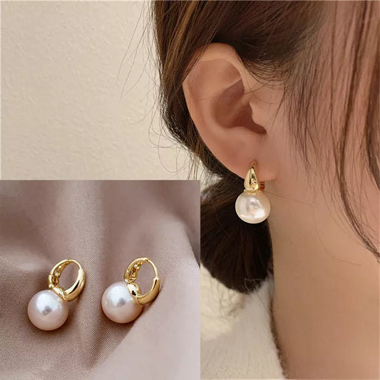 Pearl Earrings.